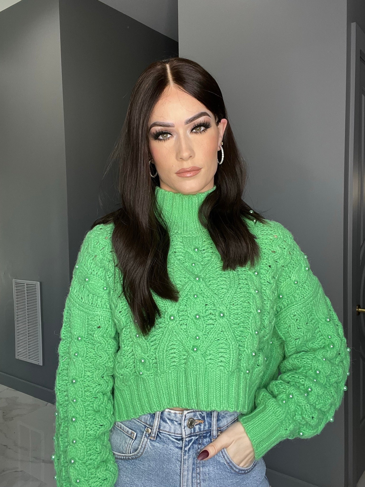 Dark brown straight human hair wig with center part, styled shoulder-length for a sleek look.