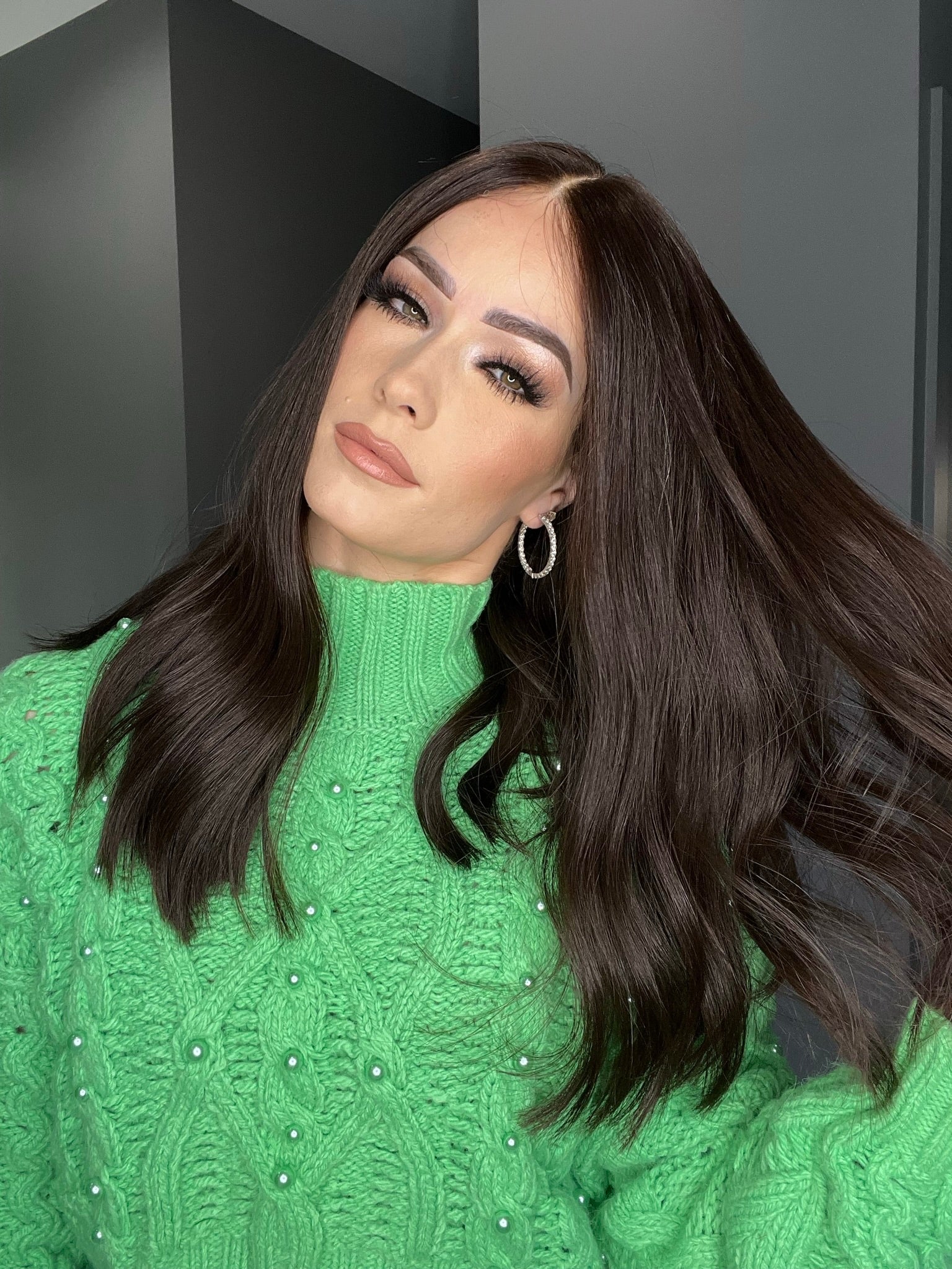 Dark brown human hair wig with loose waves, lace top, styled for a natural look