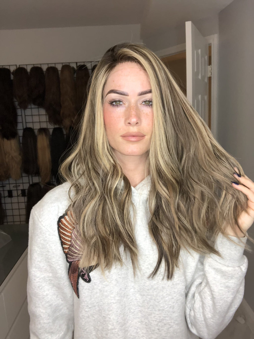 Bekawigs wig with long, wavy blonde and brown balayage human hair, featuring natural-looking money pieces and soft texture