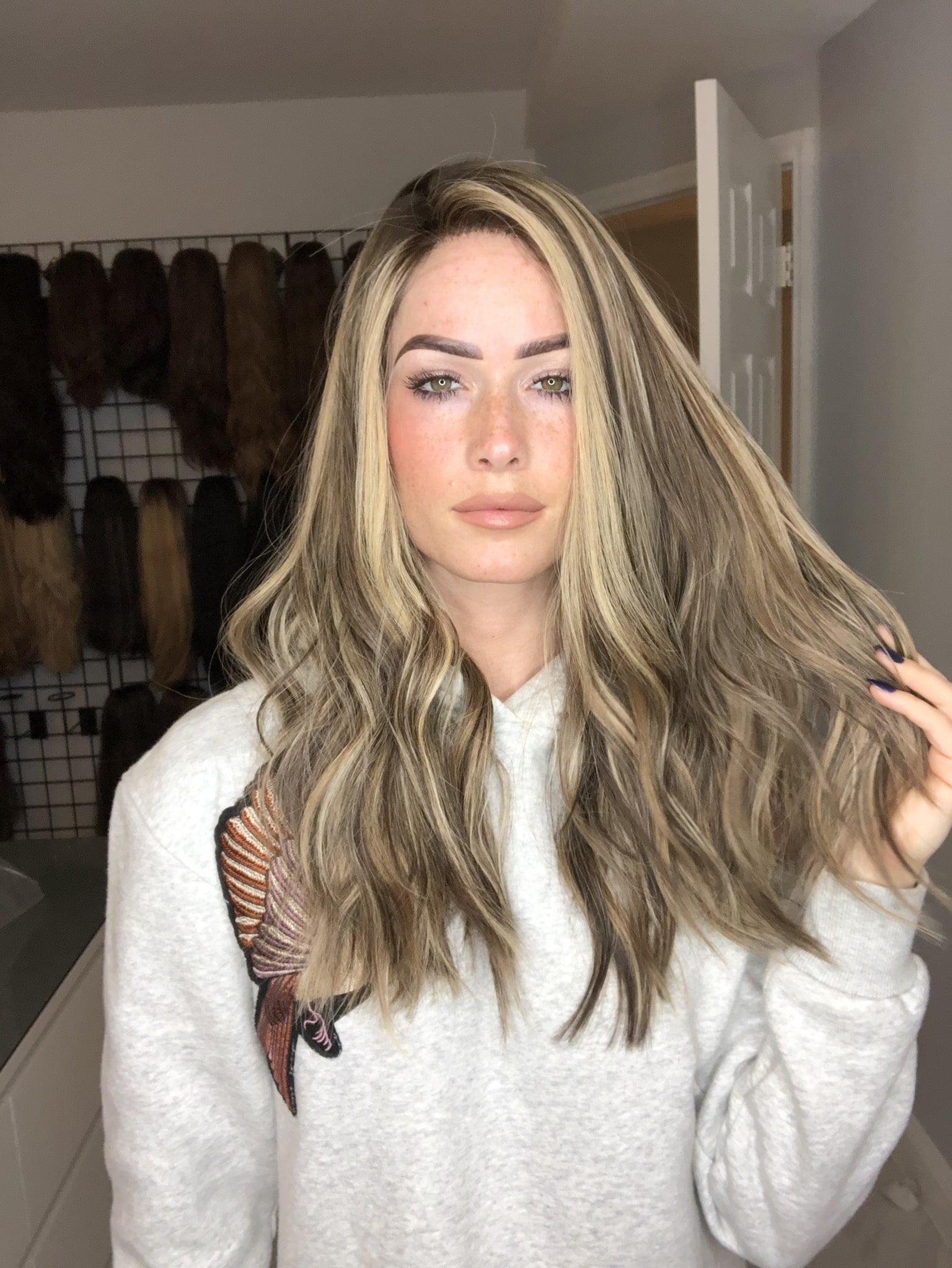 Bekawigs wig with long, wavy blonde and brown balayage human hair, featuring natural-looking money pieces and soft texture